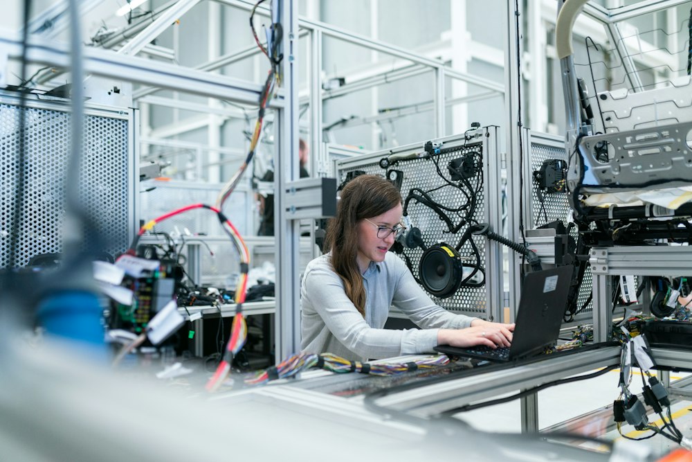 Manufacturing worker reviewing plans on the factory floor